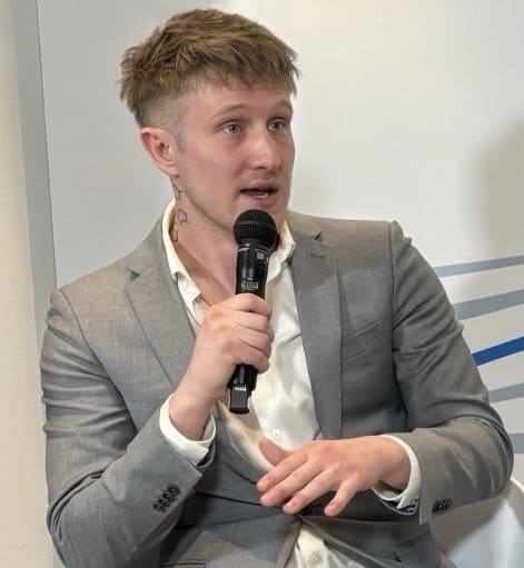 Austin Ambrozi speaking in Davos, Switzerland during the World Economic Forum (WEF)